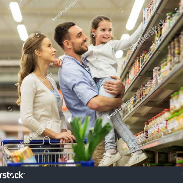 stock-photo-sale-consumerism-and-people-concept-happy-family-with-child-and-shopping-cart-buying-food-at-564103717-1