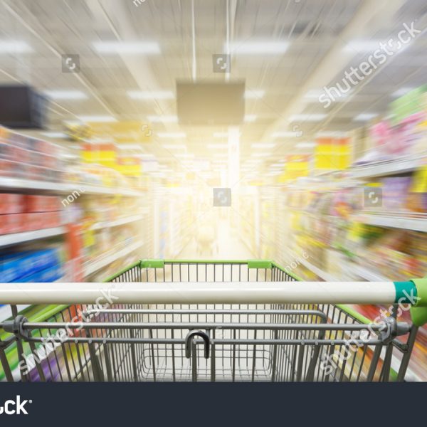 stock-photo-supermarket-aisle-with-empty-green-shopping-cart-632623610